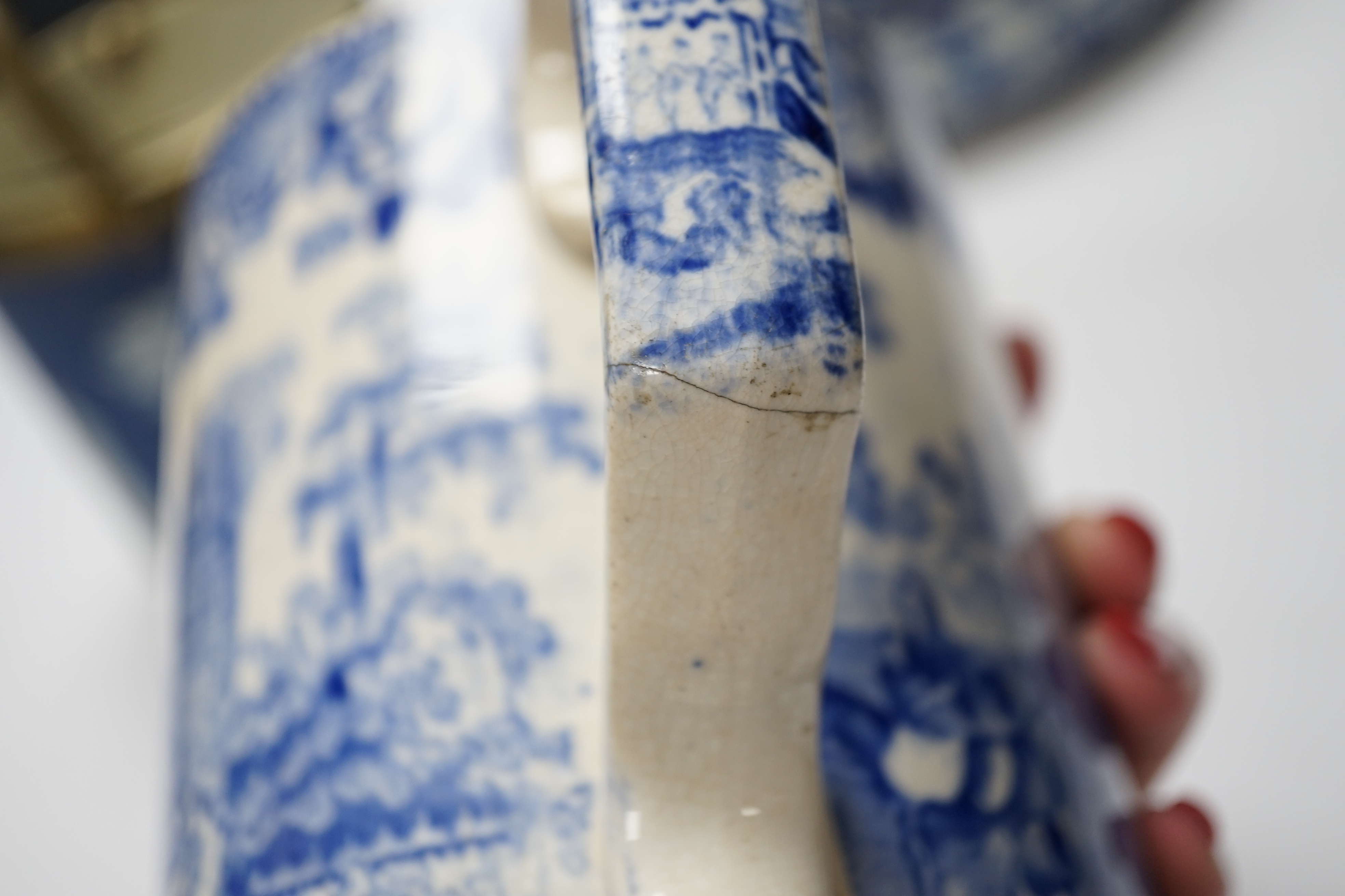 A Victorian Jasper ware cheese dome, a Wedgwood biscuit barrel and a transfer printed blue and white mug, largest 23cm in diameter